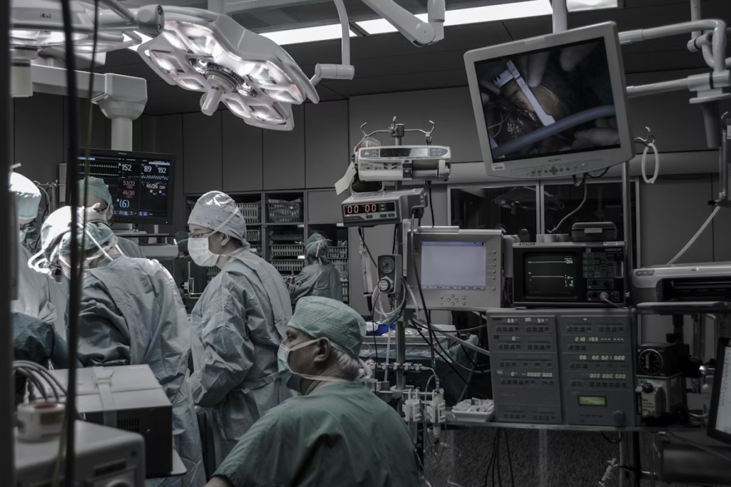 people-wearing-surgical-clothes-inside-operating-room
